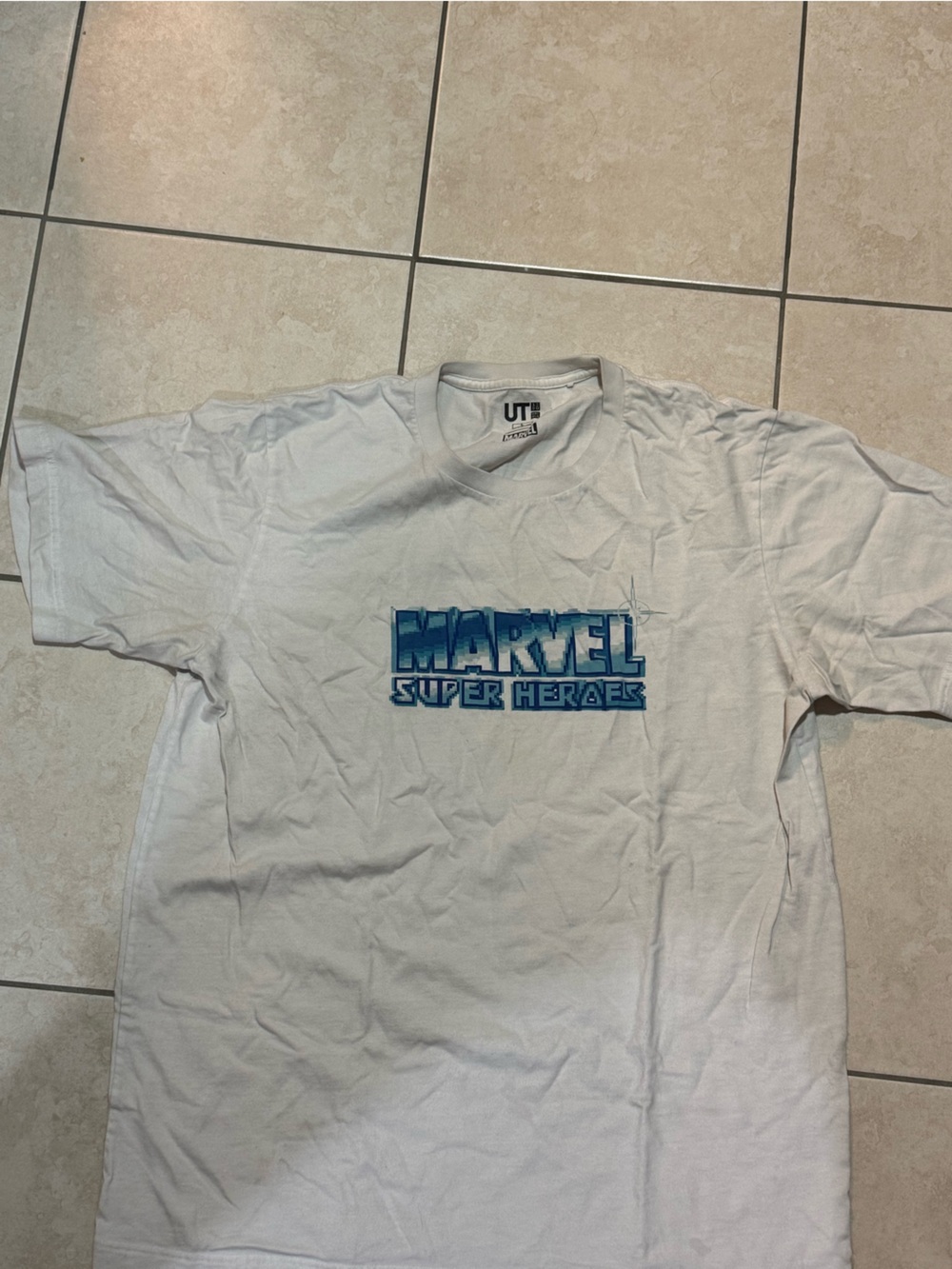 Uniqlo White Marvel Super Heroes Graphic Tee with Blue Logo